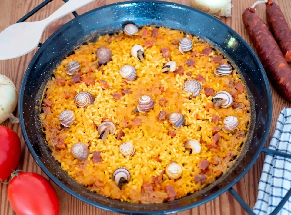 Arroz con caracoles sin fallos - caldo, fuego y reposo